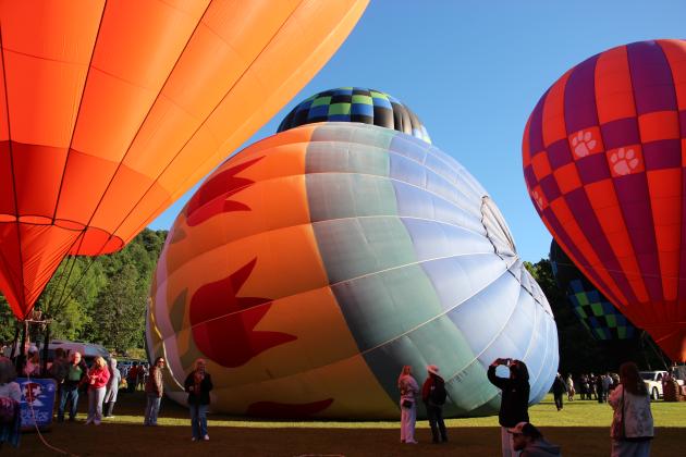 Spectators and balloon crews gather in Helen for the 53rd annual Helen to the Atlantic Balloon Race &amp; Festival on June 4. Around 20 balloons are participating in events throughout the weekend. CARLY HENDERSON/WCN