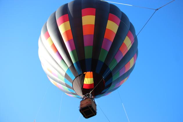 Spectators and balloon crews gather in Helen for the 53rd annual Helen to the Atlantic Balloon Race &amp; Festival on June 4. Around 20 balloons are participating in events throughout the weekend. CARLY HENDERSON/WCN