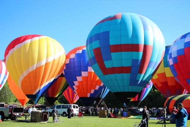 Spectators and balloon crews gather in Helen for the 53rd annual Helen to the Atlantic Balloon Race &amp; Festival on June 4. Around 20 balloons are participating in events throughout the weekend. CARLY HENDERSON/WCN