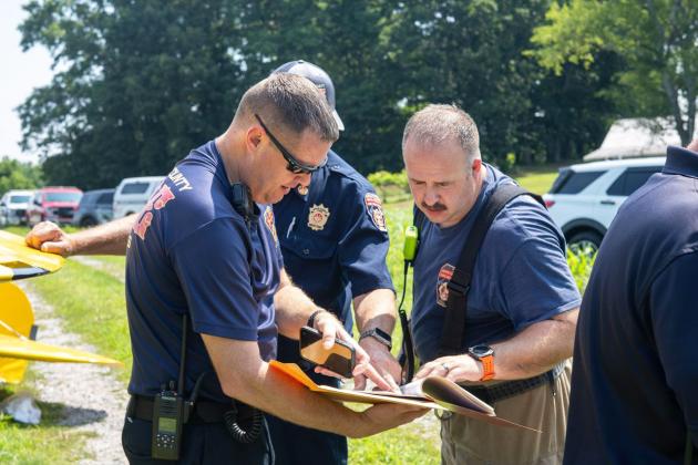 Captain Robbie Burke, Deputy Chief Terry Sosebee and Firefighter Tommy Steen were on the scene of the crash Friday morning. SUBMITTED PHOTO