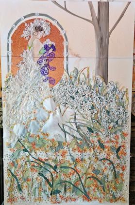 Sautee Nacoochee artist Angela Gilmore created “The Perfect Day” using her wedding dress and other materials from her previous marriage. Gilmore is currently competing in The People’s Artist competition supporting The Art of Elysium. SUBMITTED PHOTO