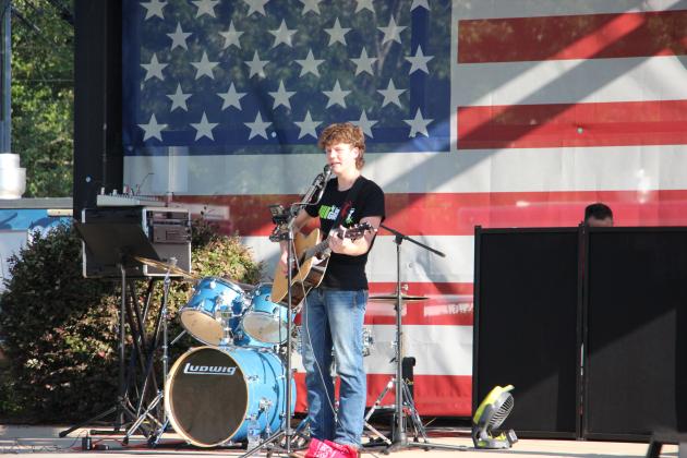 Local musician Rucker Anderson takes the stage during the Cleveland-White 250 celebration.