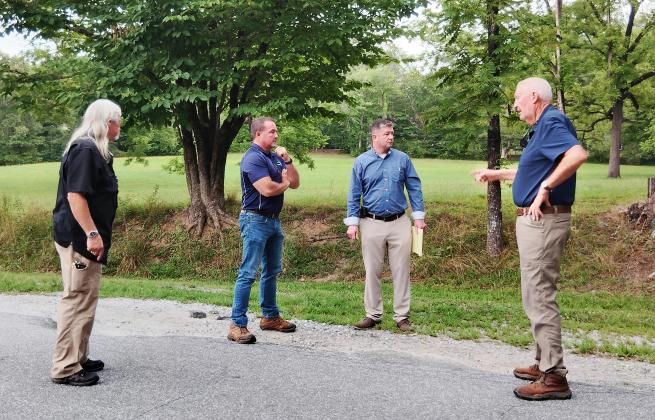 County commissioners discuss what repairs might be done on Garland Bristol Road. From left: Commissioner Craig Bryant, Chairman Travis Turner, White County Manager Derick Canupp and Commissioner Ed Nix. DENISE ETHERIDGE/WCN