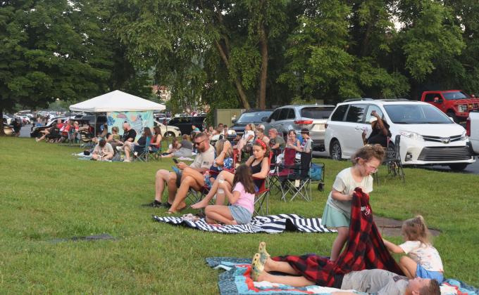 Crowds of people descended on the City of Helen to celebrate the nation's 250th Independence Day. People spread out in the city's parks on picnic blankets, tail gated in parking lots or relaxed by the Chattahoochee River. The city set off fireworks after dark from Wilkins' Field. DENISE ETHERIDGE/WCN
