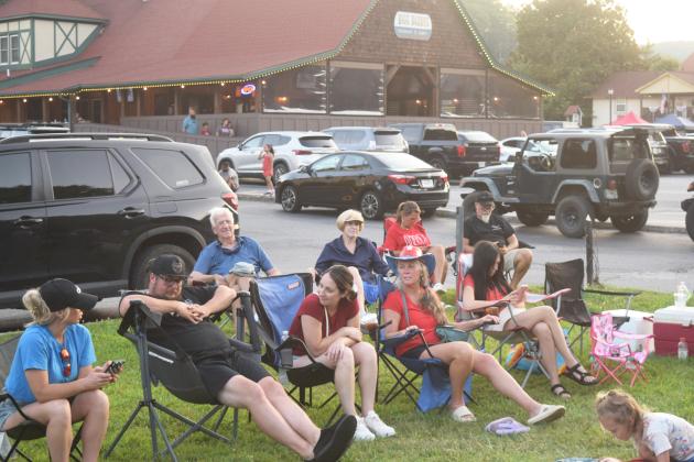 Crowds of people descended on the City of Helen to celebrate the nation's 250th Independence Day. People spread out in the city's parks on picnic blankets, tail gated in parking lots or relaxed by the Chattahoochee River. The city set off fireworks after dark from Wilkins' Field. DENISE ETHERIDGE/WCN