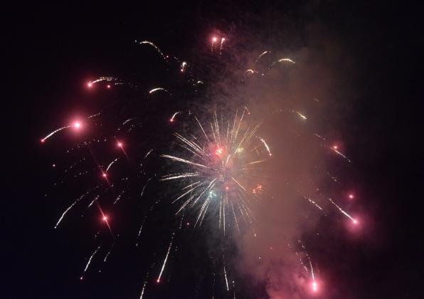 Crowds of people descended on the City of Helen to celebrate the nation's 250th Independence Day. People spread out in the city's parks on picnic blankets, tail gated in parking lots or relaxed by the Chattahoochee River. The city set off fireworks after dark from Wilkins' Field. DENISE ETHERIDGE/WCN