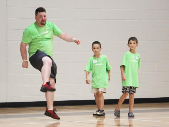 Volunteers and community members participate in games during the Open Gym, Cookout and More event at the White County Recreation Department on July 11 as part of the Love Your Neighbor initiative.