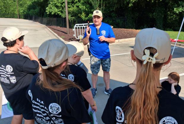 Sgt. Daren Welborn of the White County Sheriff's Office instructs junior law enforcement officers on firearms and firearm safety.