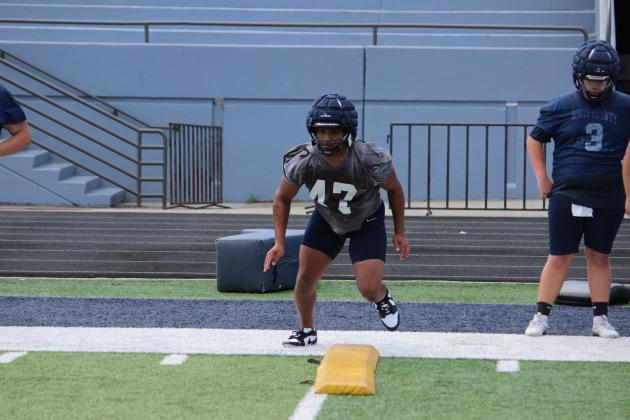 WCHS lineman Josiah Williams works through a drill during a practice last week. MARK TURNER/WCN