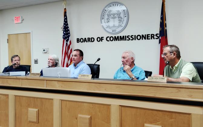 The White County Board of Commissioners is pictured during a budget workshop on April 13. From left are Commissioners Shan Ash and Craig Bryant, Chair Travis Turner, and Commissioners Ed Nix and Lyn Holcomb. The county will soon advertise both a proposed millage rate reduction, and potential tax increase. FILE PHOTO