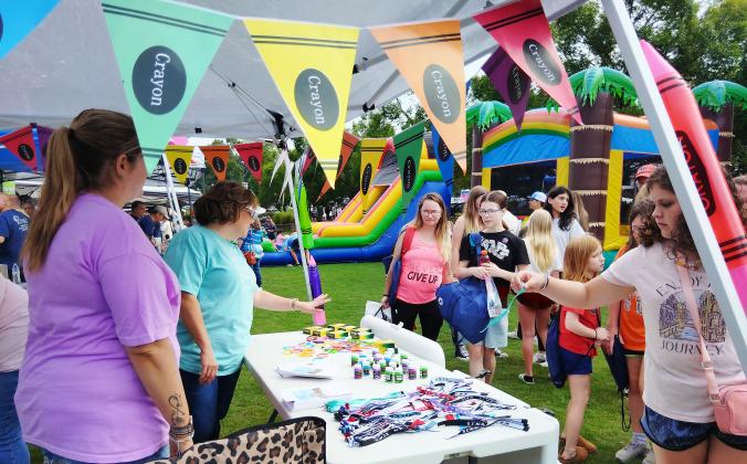 Booths like this one filled the center of Freedom Park for the Back-to-School Bash on Aug. 1.