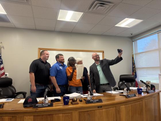 Cleveland City Council members pose for a selfie following the approval of a proclamation recognizing Tuesday, Aug. 11, as City Hall Selfie Day during the council's Aug. 17 meeting. The proclamation celebrates local government and public service and Cleveland's transition to the new Cleveland Municipal Complex at 55 Cantrell Road. CARLY HENDERSON/WCN