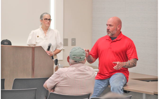 Matthew Cook said he didn’t disagree with the Lumpkin County Sheriff’s remarks about the efficacy of the Flock camera system. “It’s a great tool, and he told you about the policies for how it’s supposed to be used. The problem is, ‘supposed to’ doesn’t always work,” Cook said, as townhall host Anita Anderson Spangler looked on. KEITH MURDEN/CNI