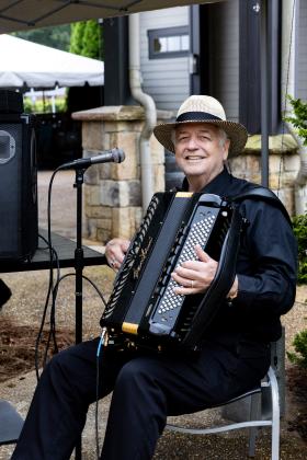The accordion player is none other than Bob Miller, founder of Yonah Mountain Vineyards. SUBMITTED PHOTO