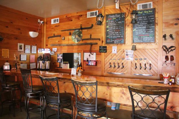 The interior of Tesnatee River Winery &amp; Meadery features family heirlooms and old farm tools, including a plow passed down through Allison’s family.
