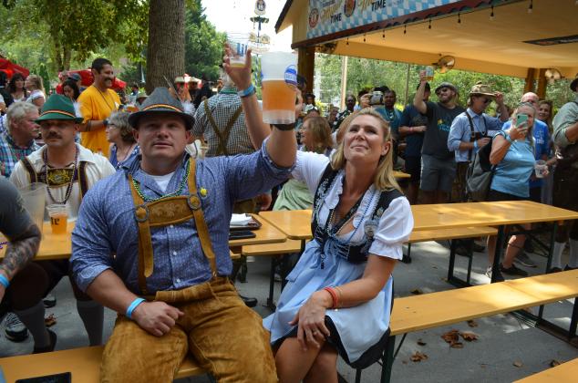 Revelers enjoy a toast during Helen's annual Oktoberfest. FILE PHOTO