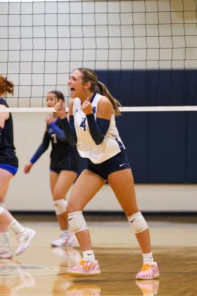 Kerrigan Cain celebrates after a point during the Lady Warriors' win over Banks County last week in Cleveland. JENNIFER KNIGHT/SPECIAL