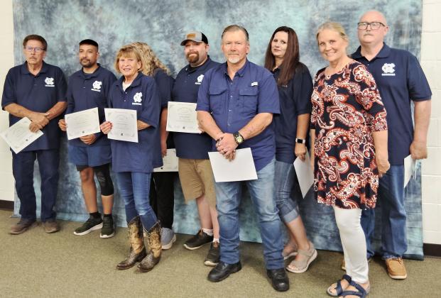 School bus drivers Arthur Thibeau, Steve Thompson, Joyce Stephens, Joshua Pruitt, Rita Freeman, Ken Gauntt, April Burdette, Michael Bowen, Floyd Rusk, Marjorie Schosser and Lorrie Sayer, and bus monitors Robin Clayton and Benny Satterfield are recognized for perfect attendance.