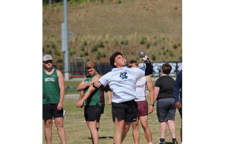 Austin Garrett won the boy's shot put competition during the first day of the 6-AAA meet. MARK TURNERWCN