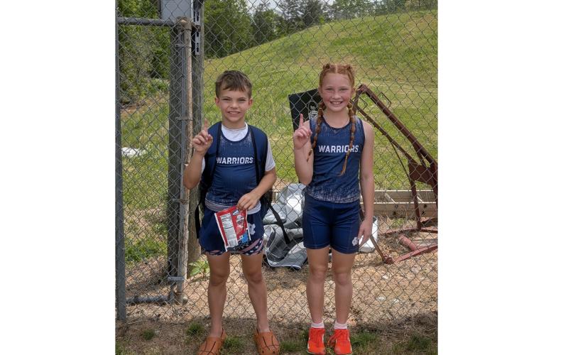 Jax Cain, left, and Bella Ellis were among the WCRD athletes to win win a distictic title. last Thursday in Cleveland. WCRD ATHLETICS/SPECIAL