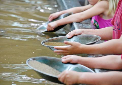 Miners young and old can strike it rich every day at one of Dahlonega’s mines with gold panning. Photo/John Bynum