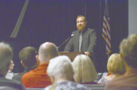 Dr. Joe Cash addresses the audience during closing remarks noting the importance of civic literacy to a healthy democracy. (Photo/Wayne Hardy)