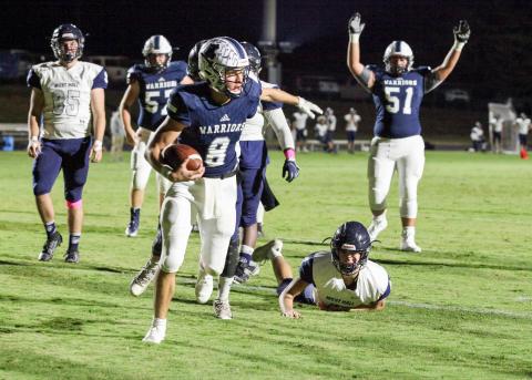 The White County Warriors celebrated Homecoming last Friday night by blasting West Hall 42-0 in a Region 7-AAAA matchup. WCHS quarterback J. Ben Haynes, above, accounted for all six of the Warriors touchdowns, running for three scores and passing for three touchdowns. (Photo/Staci Sulhoff)