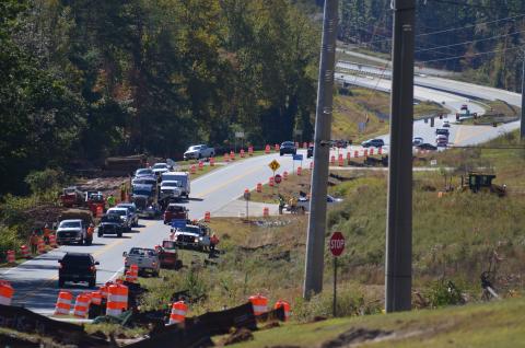 Work crews clear land Tuesday, Oct. 22, to prepare for road construction that will widen Hulsey Road in Cleveland from two lanes to five lanes, including a two-way turn lane. (Photo/Wayne Hardy)