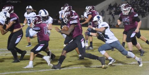 WCHS linebacker Jesse Moose, right, runs down Chestatee quarterback Christian Charles during the first half of the region game last Friday night in Gainesville. (Photos/Mark Turner)