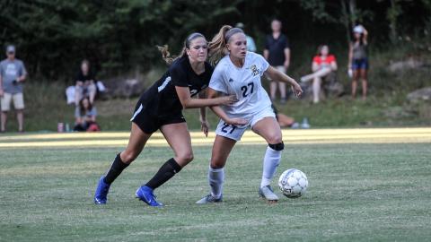Jennifer McCall, right, scored the game-winning goal in the second overtime period to give the Bears their first AAC tournament title. (Photo/TMU Athletics)