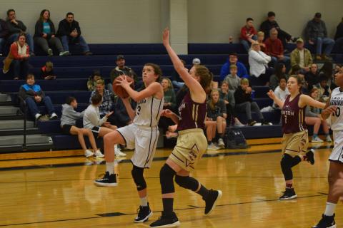 Paisley Cathey goes up for a layup during the WCMS seventh-grade girls win over Dawson County. The Lady Warriors are 7-0 this season. (Photo/Mark Turner)