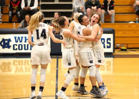 White County basketball players, from left, Rachel Lovell, Dasha Cannon, and Maddie Futch celebrated after closing out a 42-40 win over Chestatee last Friday night in Cleveland. (Photo/Staci Sulhoff)