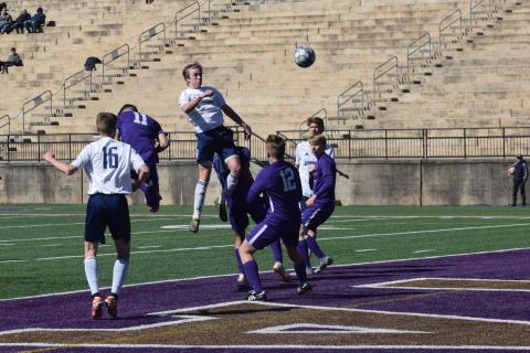 Andrew Pierce lands a header during the match with Lumpkin County. Pierce scored the winning goal in the second half. (Photo/Mark Turner)