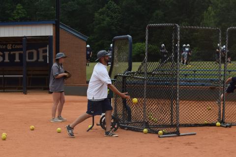 WCHS softball coach Drew Owens, shown last year during a summer workout, will be allowed to work out his players when the conditioning program begins in two weeks. (Photos/Mark Turner)