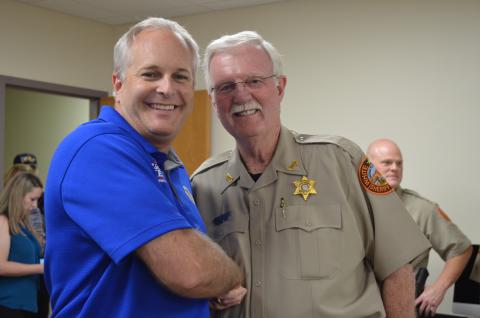 Rick Kelley, left, is congratulated by Sheriff Neal Walden after a successful election night. (Photo/Stephanie Hill)
