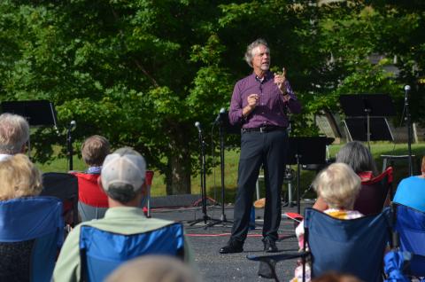 Helen First Baptist Church Pastor Jim Holmes speaks to the congregation during an outdoor service Sunday, June 28, in which Holmes was thanked for 20 years of service at the church. (Photos/Wayne Hardy)