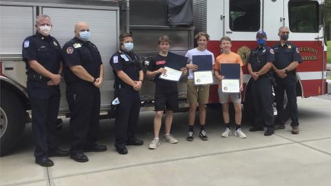 Fire services photo: Pictured, from left, are Fire Chief Seth Weaver, Paramedic Josh Eaten, EMT  Matt Hill, Jack Bandy, Daniel Green, Ben Bandy, Captain Josh Taylor, and Battalion Chief John Lumsden. (Submitted photo)