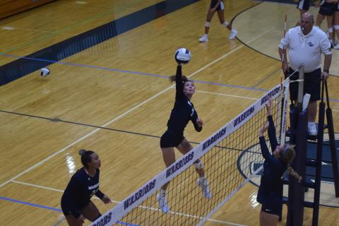 WCHS senior Shelby Spain hammers a shot during the Lady Warriors' win over Lakeview Academy Tuesday night in Cleveland. (Photo/Mark Turner)