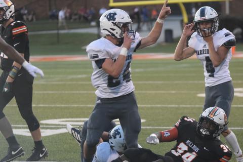 Jesse Moose, left, and Reece Dockery celebrate after Moose comes up with a fumble recovery in the second quarter of the win over Hart County. (Photo/Mark Turner)
