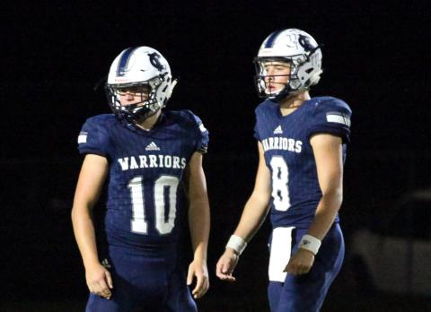 Riley Stancil, leftl, J. Ben Haynes, right, and the Warriors take on Stephens County Friday night in Cleveland in the season opener. (Photo/Mark Turner)