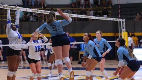 Bethany Ross, No. 5, hammers a shot at the net during the Lady Bears' opening night win over Tennessee Wesleyan Tuesday in Cleveland. (Photo/TMU Athletics)
