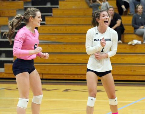 Macy Boggs, left, and Shelby Spain celebrate during the team's win over Habersham Central. (Photo/Staci Sulhoff)
