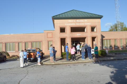 The line of White County residents waiting to cast their ballots on the first day of in-person voting was out the door of the voter registrar’s office at times during the morning of Tuesday, Oct. 13. (Photo/Stephanie Hill)