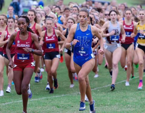 University of Kentucky's Jenna Gearing, right, and Alabama's Mercy Chelangat sprint to the front of the field during the start of the SEC Women's Cross Country Championship meet last Saturday in Baton Rouge, La. (Photo/ukathletics.com)