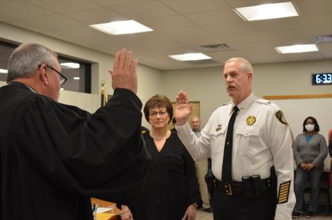 Cleveland Municipal Court Judge Garrison Baker swore in Jeff Shoemaker as the new Cleveland police chief on Monday, Feb. 8. Pictured with Shoemaker is his wife, Andrea Shoemaker. (Photo/Stephanie Hill)