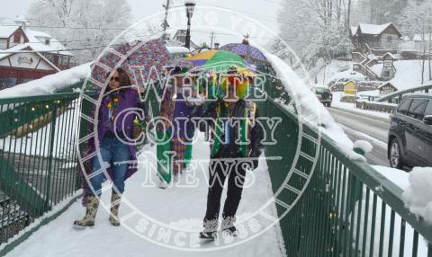 The 10th Annual Sidewalk and Tubing parade will take place this Saturday, Feb. 6, in Helen. Last year participants were treated to several inches of snow during the event.  (File photo/Stephanie Hill)