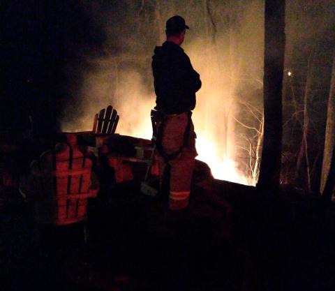 Firefighters worked hard on Sunday, March 7 to protect homes from a wildfire on Yonah Mountain. (Photos courtesy White County Public Safety)