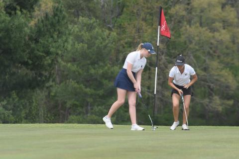 WCHS senior Catie Craig taps in a putt during the Spring Swing last Saturday in Clarkesville. (Photo/Mark Turner)
