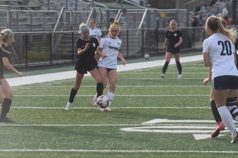 Hazen Ramey, right, set the single season scoring record Tuesday night, scoring her 25th goal of the season in the 3-0 win over North Hall. (Photo/Mark Turner)