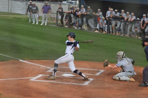 J. Ben Haynes rips a double down the third base line to drive in the Warriors' lone run in an 8-1 loss to Cherokee Bluff last Friday in Cleveland. (Photos/Mark Turner)